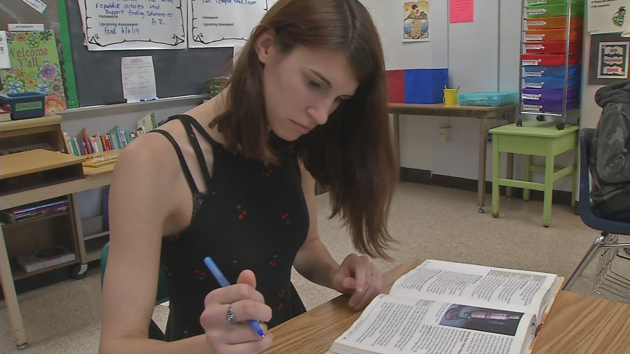 JCPS senior defies the odds with a smile, graduates with diploma and college degree